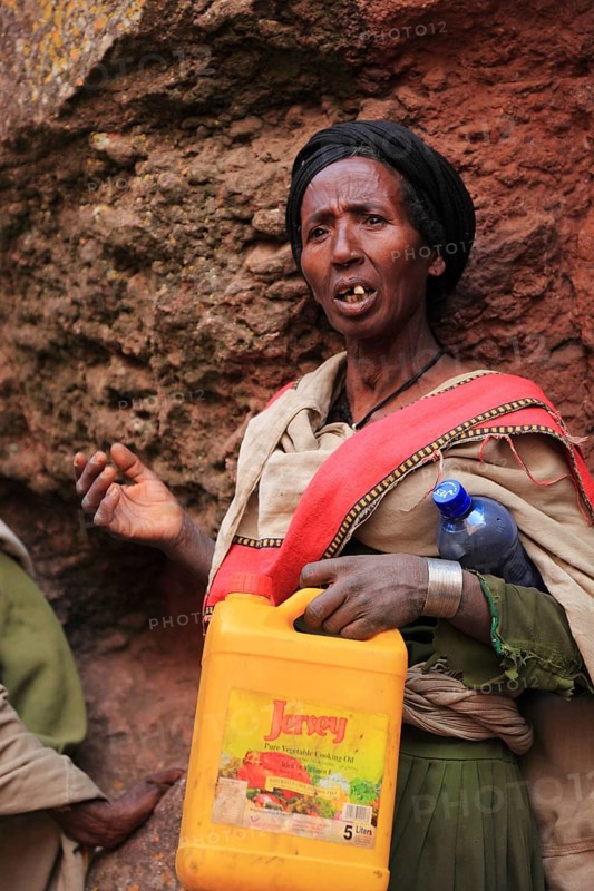 Pilgrim at the rock-hewn churches in Lalibela, container for holy water, Ethiopia, Africa