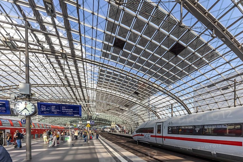 Central station with platform hall with glass roof construction with integrated photovoltaic system, ICE, Berlin, Germany, Europe