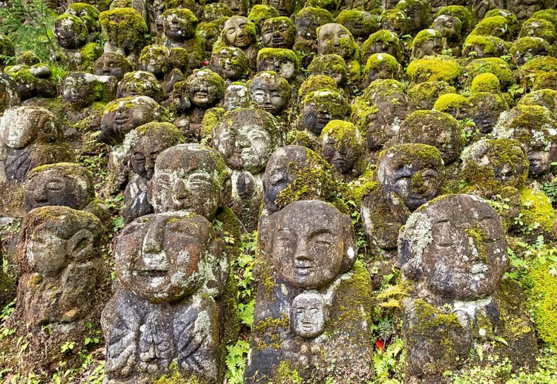 Moss-covered stone statues of rakans, the disciples of Buddha, Otagi Nenbutsu-ji temple, Kyoto, Japan, Asia