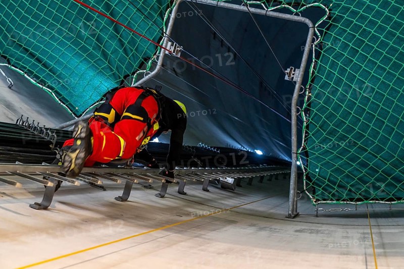 Height rescuers from the Oberhausen professional fire brigade practise abseiling from a wind turbine from a height of 150 metres, ascent into the turbine, to the nacelle, Issum, North Rhine-Westphalia, Germany, Europe