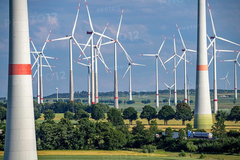 Wind farm north-east of Bad Wünnenberg, East Westphalia Lippe, Paderborn district, with the A44 motorway running through the middle, grain field, North Rhine-Westphalia, Germany, Europe