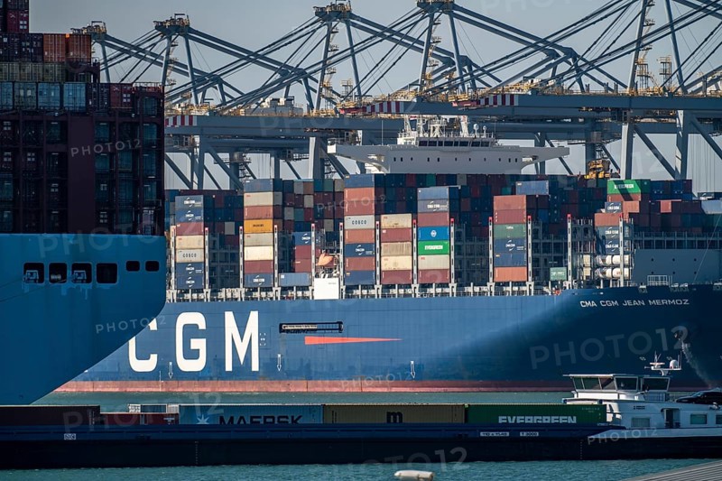 The seaport of Rotterdam, Netherlands, deep sea harbour Maasvlakte 2, on a man-made land area off the original coast, APM Container Terminal, in front the MAASTRICHT MAERSK container ship, behind the CMA CGM Jean Mermoz, being loaded/unloaded, Rotterdam, Netherlands