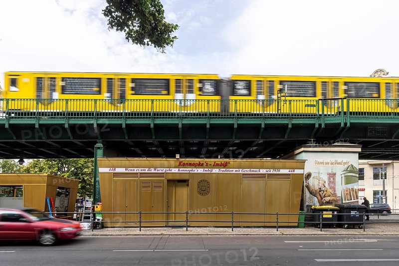 Konnopke's snack bar is cult. Konnopke's in Prenzlauer Berg. It was the first snack bar in East Berlin to introduce the currywurst in 1960. Underground as an above-ground elevated railway on a viaduct. Berlin, Germany, Europe