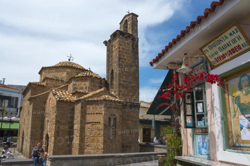 Byzantine church next to a snack shop with people walking around, Church of the Apostles, Agii Apostoli, cross-domed church, Kalamata, Messinia, Peloponnese, Greece, Europe