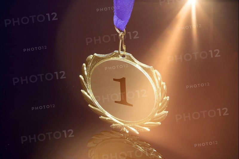 Close-up of a symbolic gold medal