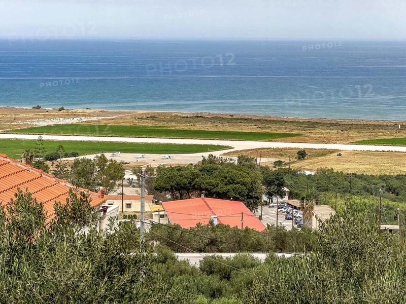 View from military cemetery hill height 107 near Maleme on runway landing strip from today small not public used sports airfield of Chania Aeroclub in World War II contested military airfield on north coast of Crete, Maleme, Crete, Greece, Europe