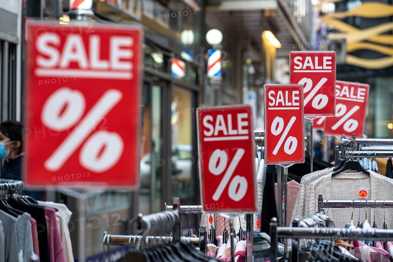 Sale, special offers of a clothing shop in the pedestrian zone, in Duisburg, North Rhine-Westphalia, Germany, Europe
