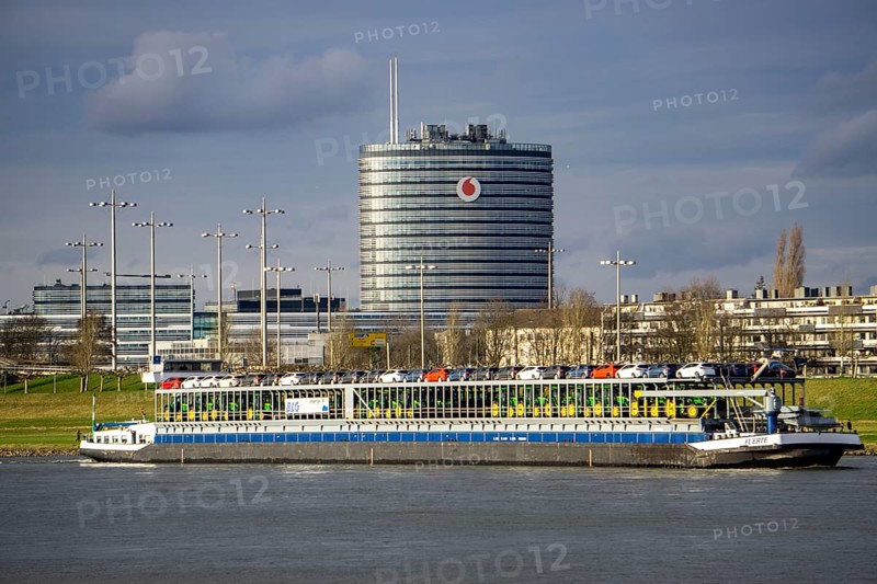 The Rhine at Neuss Vodafone building, cargo ship, vehicle transporter Fuerte, of BLG Autotransport Logistics, North Rhine-Westphalia, Germany, Europe
