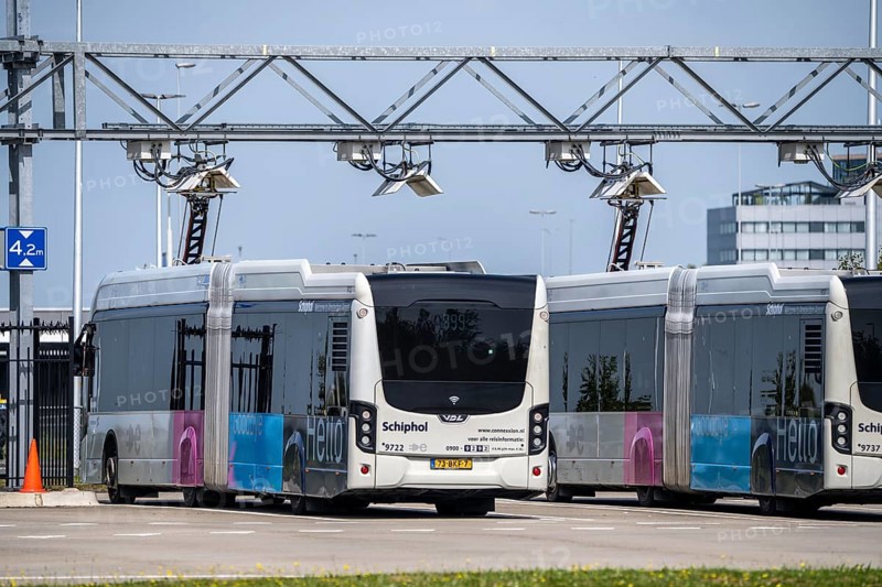 Fast charging station for electric buses at Amsterdam Schiphol Airport, the entire fleet of passenger transport buses is electric, over 200 vehicles, during breaks the buses are recharged via a roof-mounted pantograph, vehicles of the transport company Connexxion, Netherlands