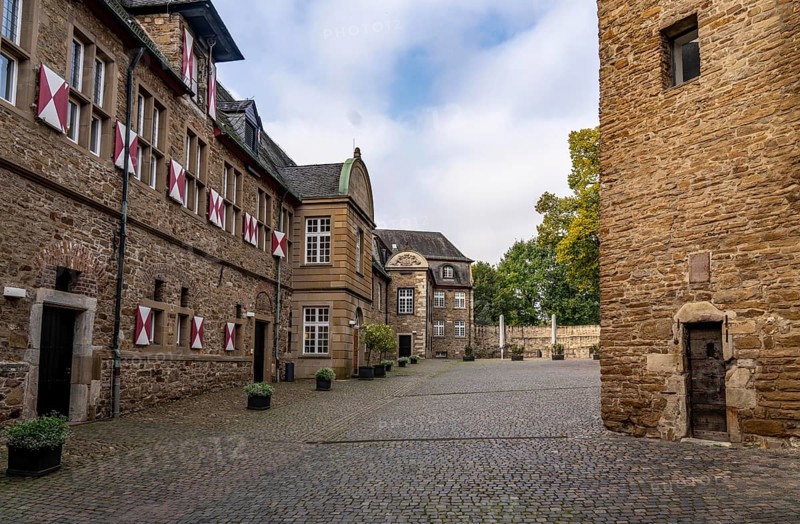 Broich Castle on the west bank of the Ruhr near the city centre, the fortification is in parts the oldest preserved early medieval fortification from the late Carolingian period north of the Alps, today a museum and event location, in Mülheim an der Ruhr, North Rhine-Westphalia, Germany, Europe