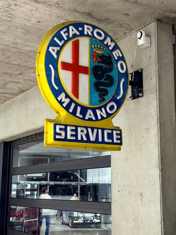 Old historic neon sign with coat of arms and Alfa Romeo Milano lettering, Classic Remise, Düsseldorf, North Rhine-Westphalia, Germany, Europe