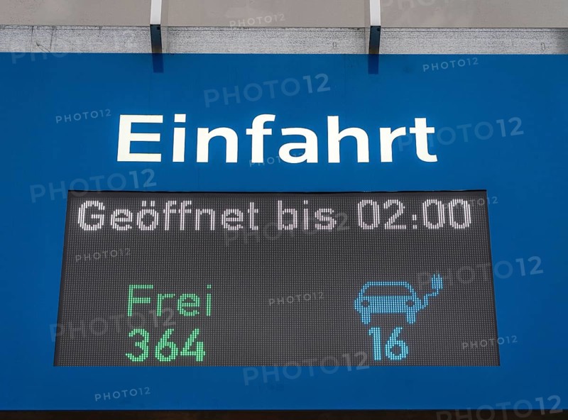 Display board at a public car park, showing free parking spaces for electric cars, North Rhine-Westphalia, Germany, Europe