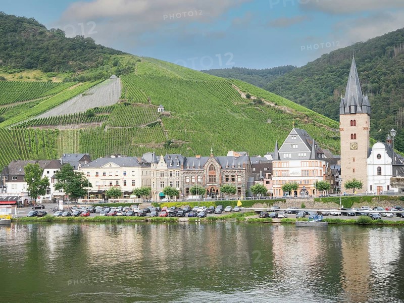 Bernkastel with vineyards and the former watchtower and current tower of the parish church of St Michael, Bernkastel-Kues, Moselle, Rhineland-Palatinate, Germany, Europe