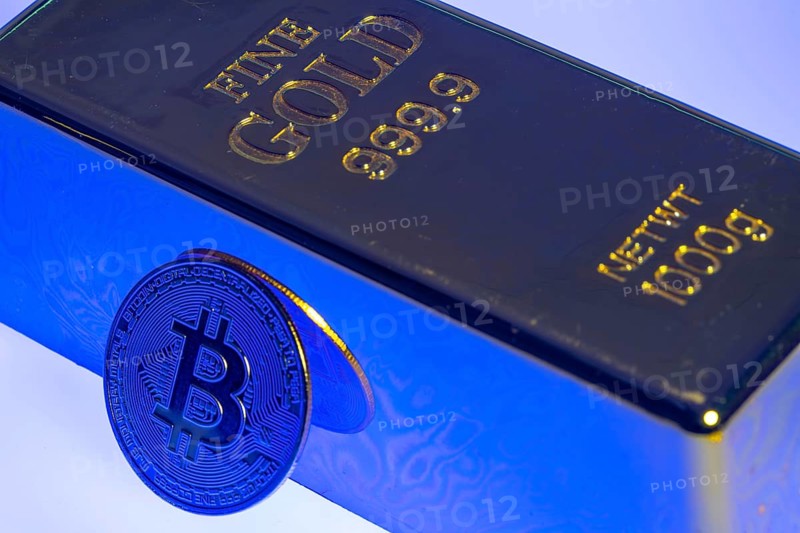 Cryptocurrency, gold bar, guarantor for analogue currencies, symbol coin, optical placeholder for the digital currency, blockchain, stock market prices