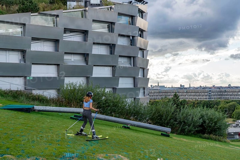 CopenHill, waste incineration plant and artificial ski slope, skiing with a view of the ski lift, 90 metres high and 400 metres long slope on artificial turf, Copenhagen, Denmark, Europe
