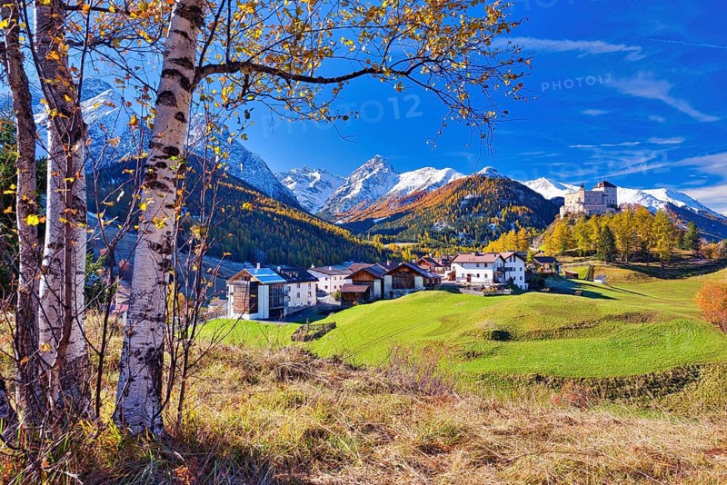 Village view of Tarasp with castle in autumn, Scuol, Canton Graubünden, Switzerland, Europe