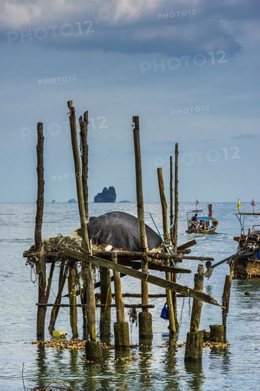 Remains of a jetty at Phang Nga bay near Koh Yao Noi, seascape, seascape, nature, longtail boat, fisherman, fishing boat, locals, work, lifestyle, sky, panorama, limestone, sandstone, holiday, travel, tourism, sun, sunny, climate, water, sea, ocean, poverty, asian, dilapidated, ruin, coast, coastal landscape, paradise, holiday paradise, paradisiacal, boat, island, symbolic, asian, travel photo, exotic, atmosphere, Phangnga, Phuket, Thailand, Asia