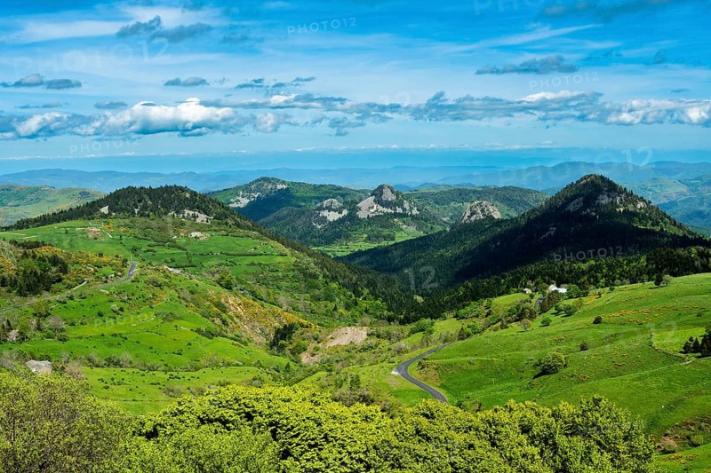 Scenic View of Dome-Shaped Volcanic Peaks (Sucs) in the Monts d'Ardeche Regional Natural Park. Auvergne-Rhone-Alpes. France