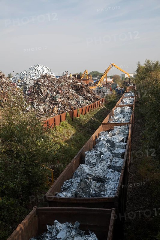 Scrap metal recycling loading train wagons with processed metals, EMR company, Swindon, England, UK