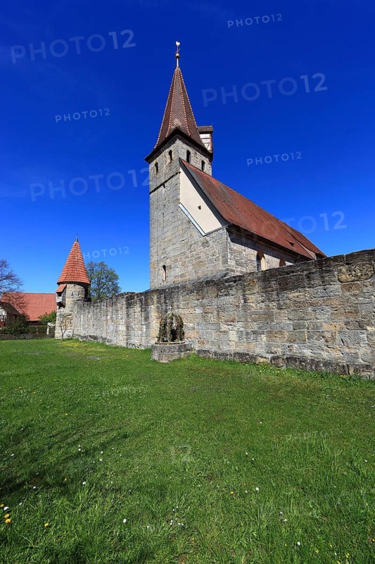 Small Easter fountain in front of the fortified church from the Middle Ages, fortified church, Effeltrich in Franconian Switzerland, district of Forchheim, Upper Franconia, Bavaria, Germany, Europe