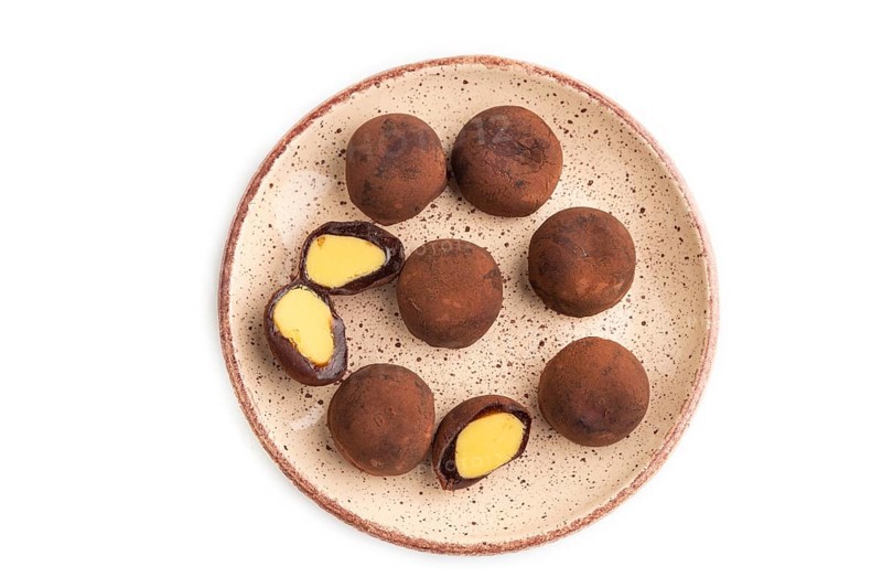 Japanese rice sweet buns chocolate mochi filled with cream isolated on white background. top view, flat lay, close up