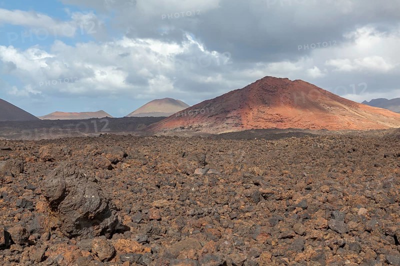 Lava field, volcanic landscape and fire mountains near Los Hervideros, Lanzarote, Canary Islands, Spain, Europe