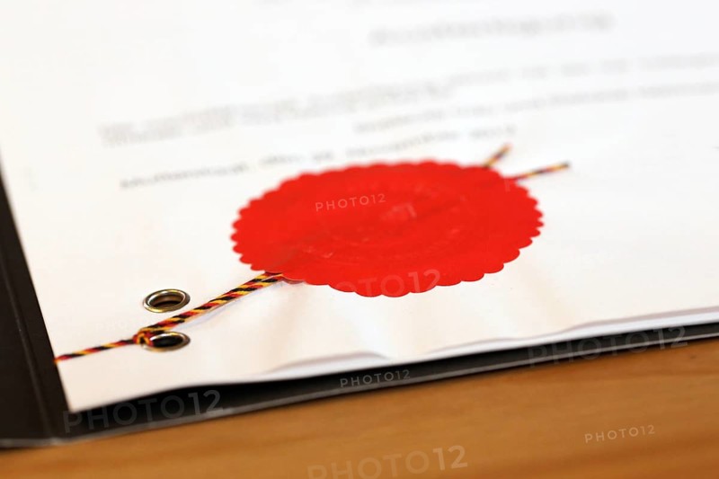 Notarised contract with red official seal