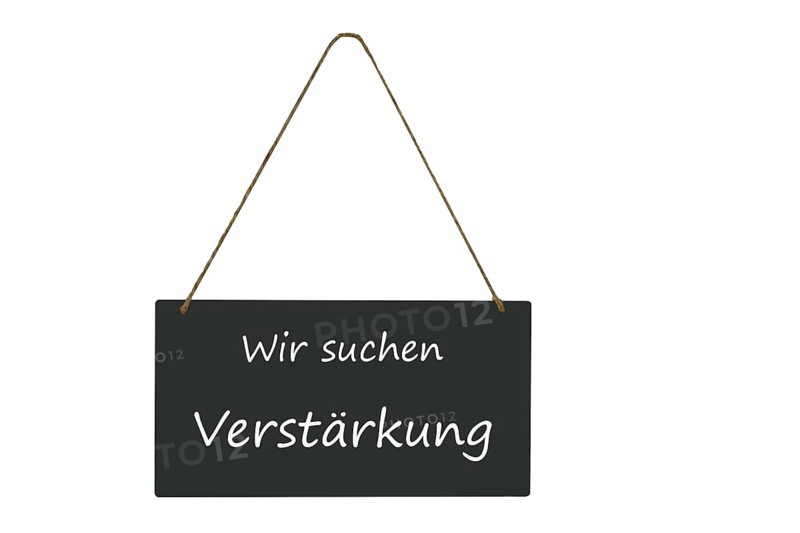 Freestanding sign with the inscription We are looking for reinforcement
