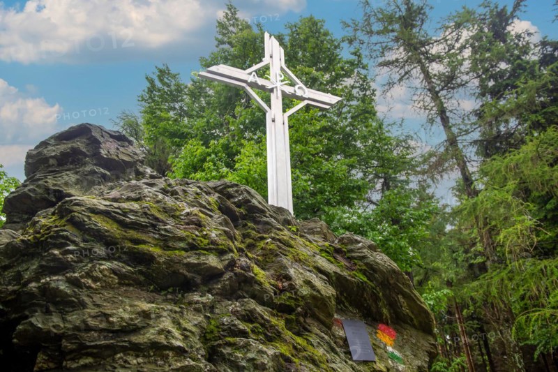 Summit cross on the Geschriebenstein in Austria. At 884 metres above sea level, the Geschriebenstein is the highest mountain in Burgenland and western Hungary. It marks the border between Austria and Hungary