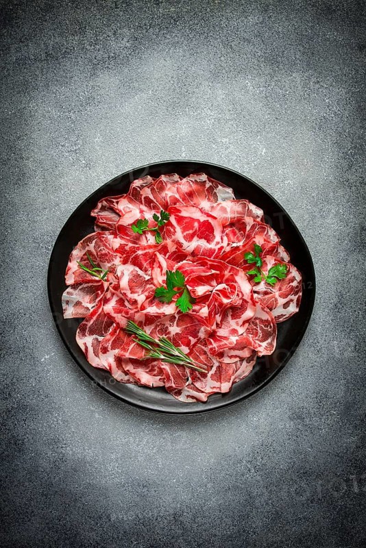 Sliced cured ham, prosciutto, italian dish, delicacy, parma ham, top view, no people