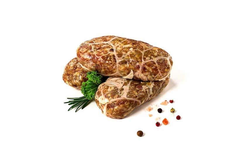 Traditional Cypriot Seftalia dish, raw, top view, on a white background, no people