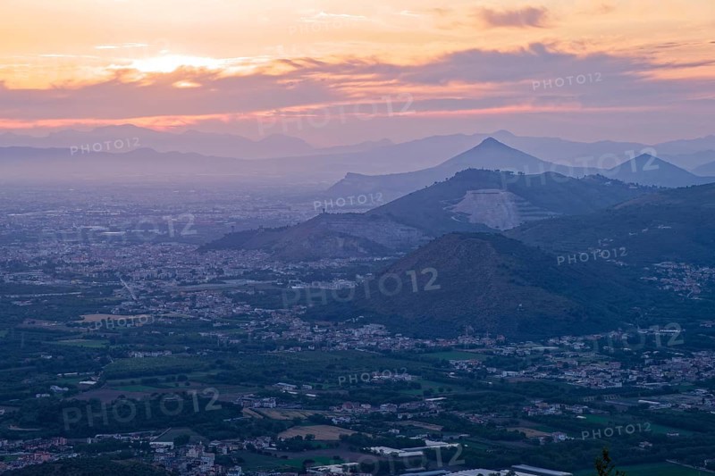 View of the densely populated Neapolitan region and the mountains near Caserta in the hazy evening light. San Felice a Cancello, Caserta, Campania, Italy, Southern Europe, Europe