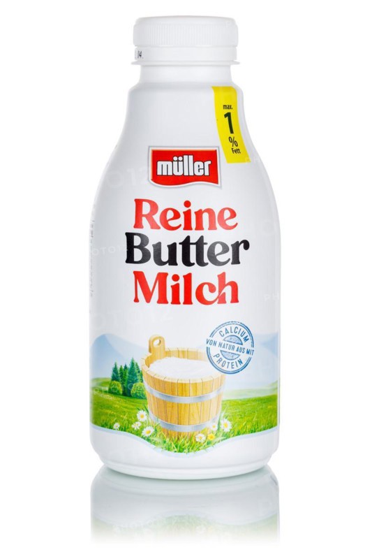 Pure buttermilk from the company Theo Müller cropped in front of a white background