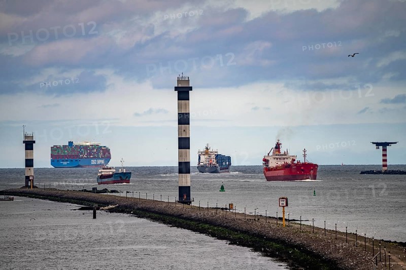Entrance to the seaport of Rotterdam, various ships, container freighter, Cosco Shipping Aries, feedership, tanker, enters the harbour of Rotterdam, out, Nieuwe Waterweg, Netherlands