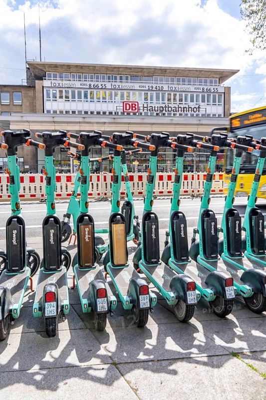 Parking space for e-scooters at the main railway station, provider Tier, in e-scooter sharing with Ruhrbahn, Essen, North Rhine-Westphalia, Germany, Europe