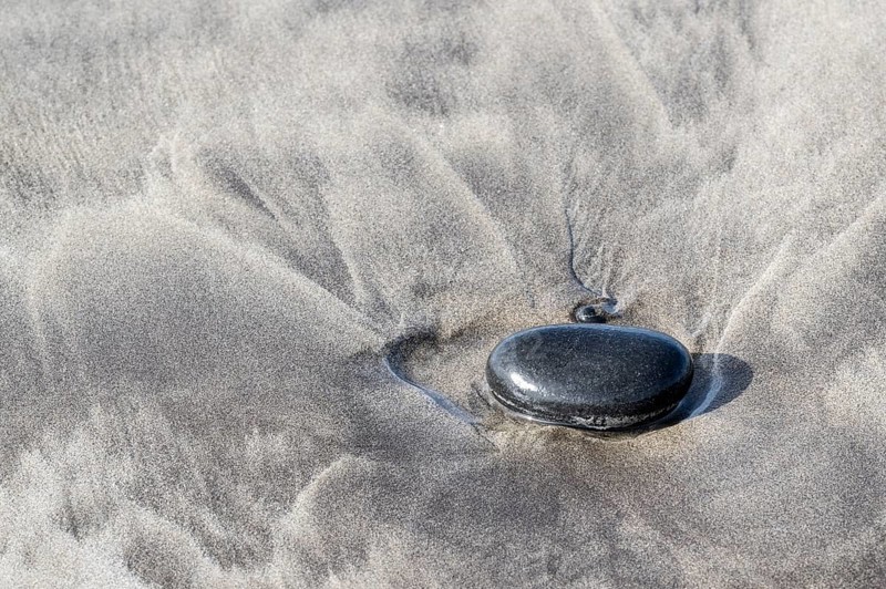 Lava pebbles on the beach, Playa de Famara, Lanzarote, Canary Islands, Spain, Europe