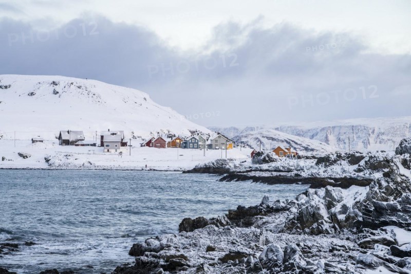 Colourful houses in a snowy landscape, fishing village Kongsfjord, Berlevåg, Varanger Peninsula, Finnmark, Northern Norway, Norway, Europe