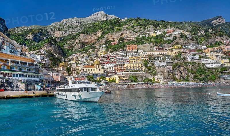 View from the boat of the village on the cliffs above the sea, Positano, Amalfi Coast, Amalfitana, Campania, Italy, Europe