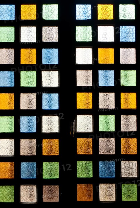 Contemporary stained glass window at Notre Dame de la delirance church, Popenguine, Senegal. Popenguine is a christian pilgrimage site since the apparition of the black madonna in 1986