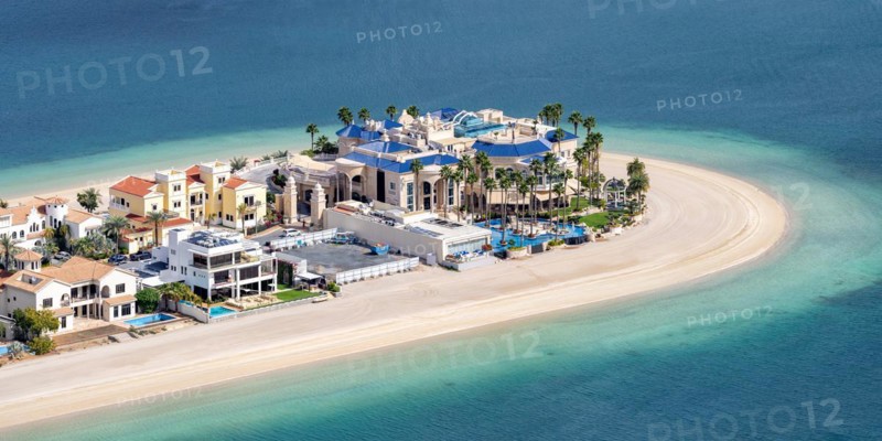 Luxury villas properties on The Palm Jumeirah man-made island with beach panorama in Dubai, United Arab Emirates, Asia