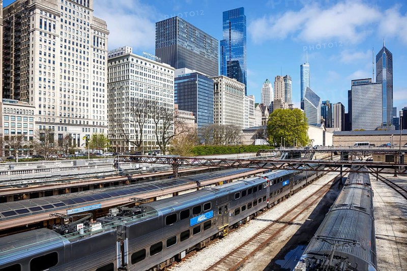 Skyline with METRA commuter train railway at Van Buren Street station in Chicago, USA, North America