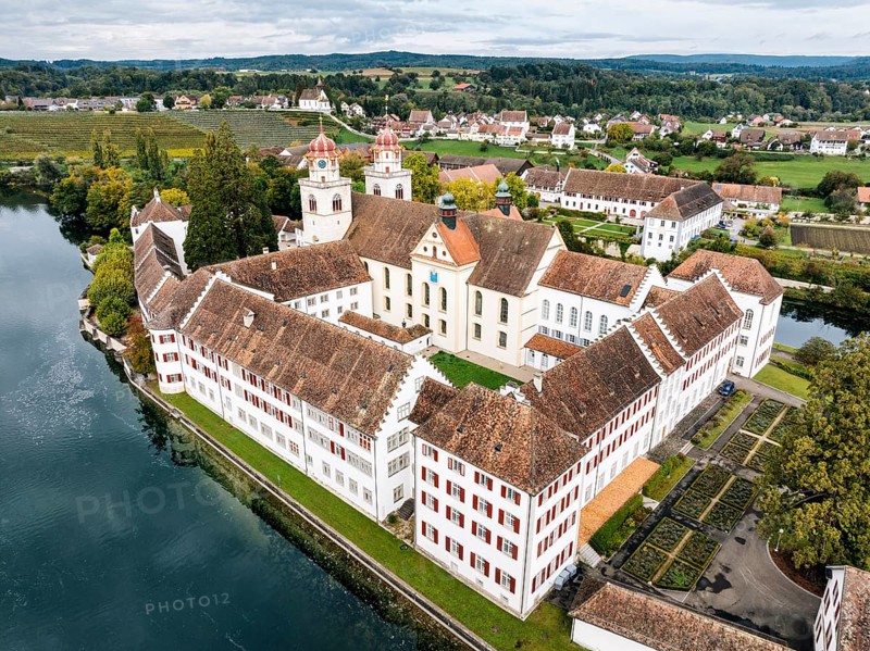Aerial view of the former Benedictine abbey with the monastery church of St Mary on the Rhine island of Rheinau, Andelfingen, Canton Zurich, Switzerland, Europe