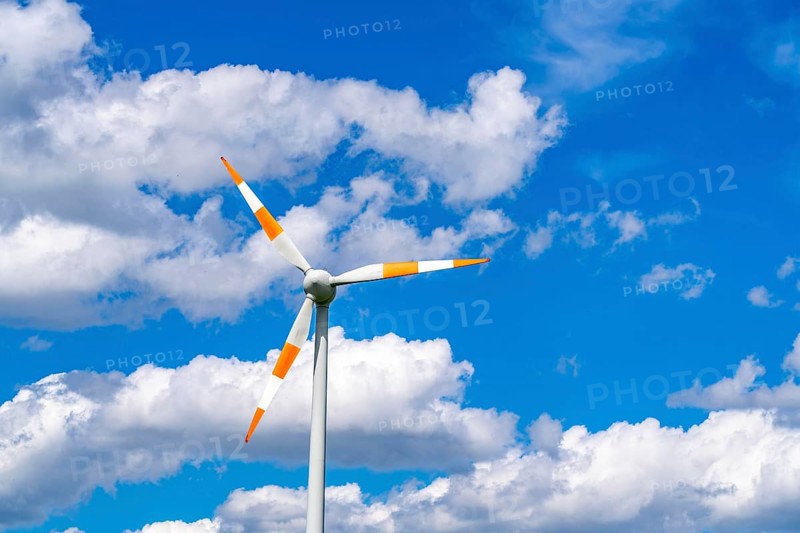 Wind turbine, wind energy plant from the manufacturer Enercon, blue sky with many white clouds, near Schermbeck, North Rhine-Westphalia, Germany, Europe