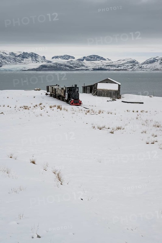 Historic mine railway in winter landscape, Kongsfjord, Ny-Ålesund, Spitsbergen Island, Svalbard and Jan Mayen archipelago, Norway, Europe