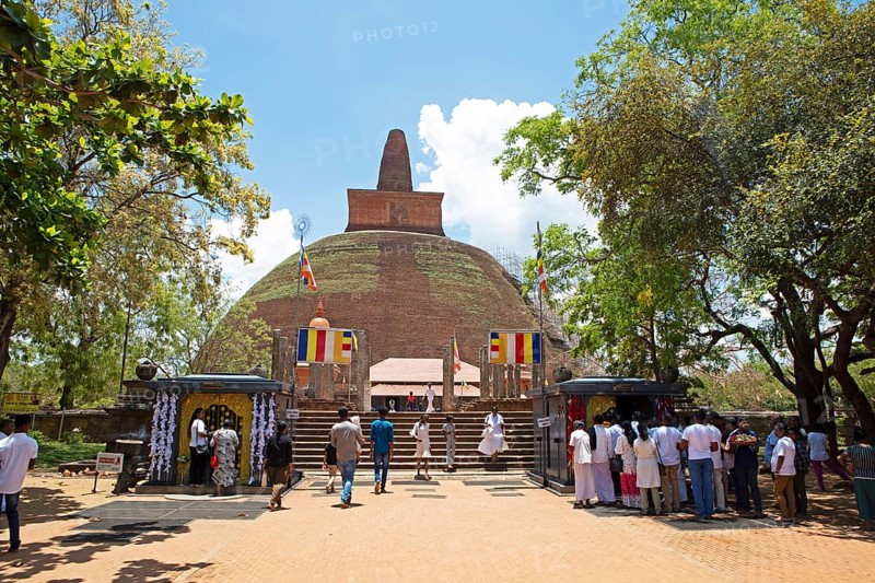 Sri Lankan pilgrims at the Abhayagiri Stupa in the holy city of Anuradhapura, North Central Province, Sri Lanka, Asia