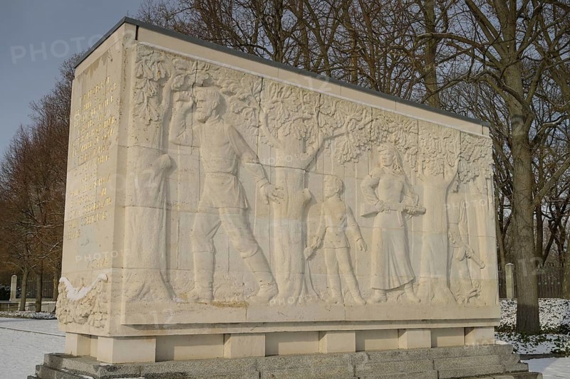 Sarcophagus with stone relief, Theme: Destruction and Suffering in the Soviet Union, Soviet Memorial, Winter, Treptower Park, Treptow, Treptow-Köpenick, Berlin, Germany, Europe