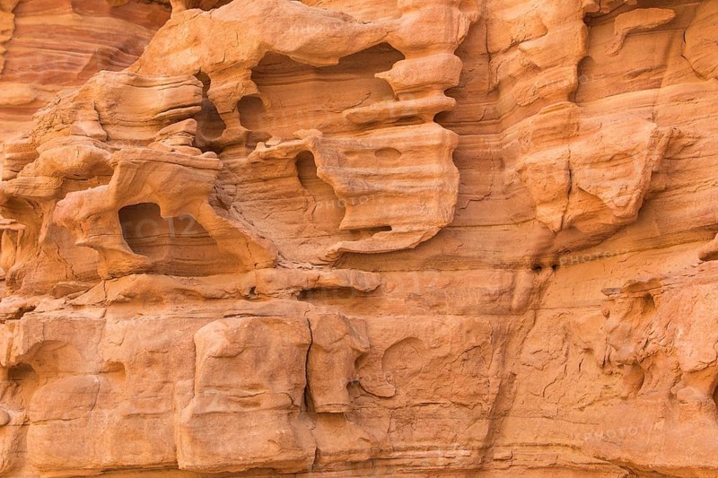 Natural texture of red rocks. Colored canyon, Egypt, desert, the Sinai Peninsula, Nuweiba, Dahab, Africa