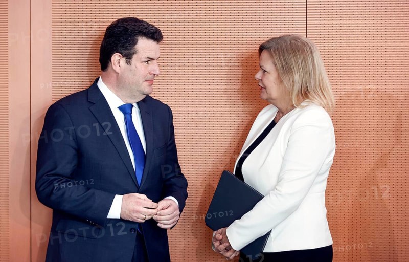Hubertus Heil, Federal Minister of Labour and Social Affairs and Federal Minister of the Interior Nancy Faeser speak in front of the start of the Cabinet meeting in the Chancellery, Berlin, 29 03 2023