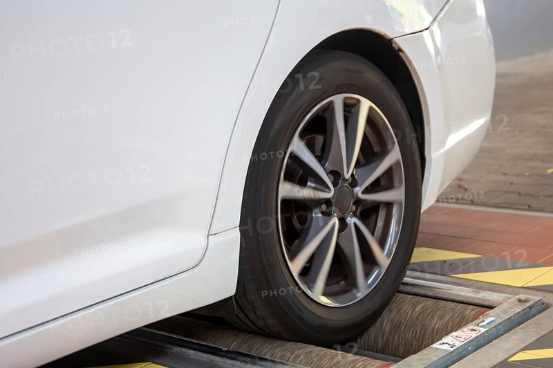 Car on the brake test bench (brake test)