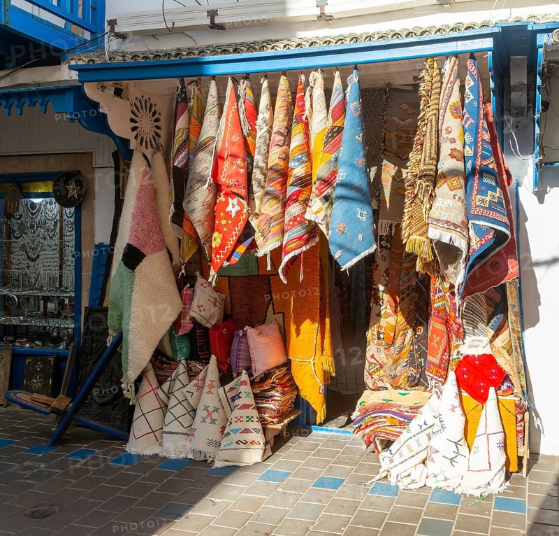 Traditional rugs hanging on display outside shop in medina area of Essaouira, Morocco, north Africa, Africa
